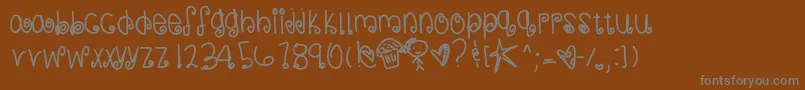 フォントSweetmemories – 茶色の背景に灰色の文字