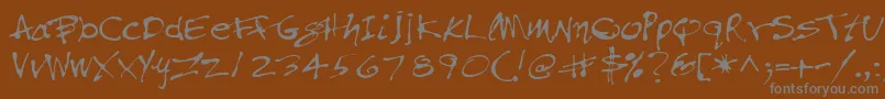 フォントPfinkpen – 茶色の背景に灰色の文字