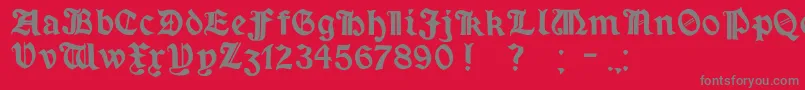 MinimExtrabold-Schriftart – Graue Schriften auf rotem Hintergrund