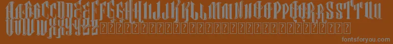 VtksClassicalHit-fontti – harmaat kirjasimet ruskealla taustalla