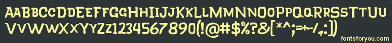 KlapjoRegular Font – Yellow Fonts on Black Background