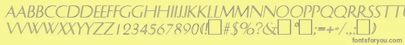 フォントDelphinItalic – 黄色の背景に灰色の文字