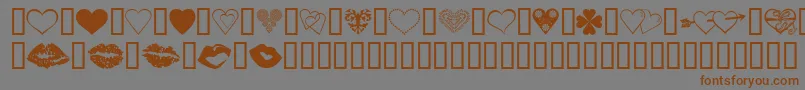LuvNKisses Font – Brown Fonts on Gray Background
