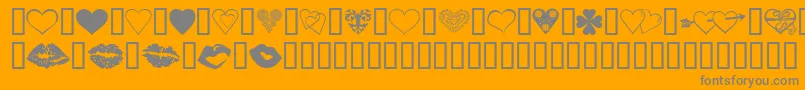 LuvNKisses-fontti – harmaat kirjasimet oranssilla taustalla