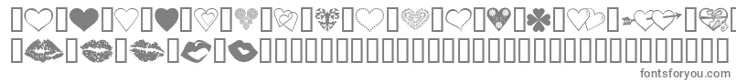 LuvNKisses-fontti – harmaat kirjasimet valkoisella taustalla