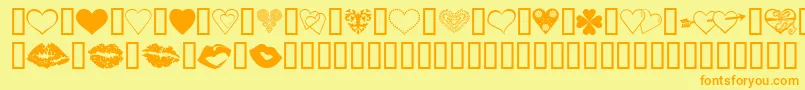 フォントLuvNKisses – オレンジの文字が黄色の背景にあります。