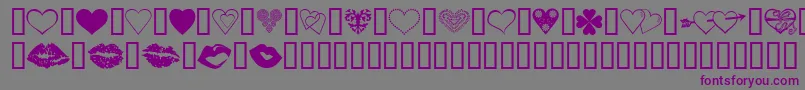 Шрифт LuvNKisses – фиолетовые шрифты на сером фоне