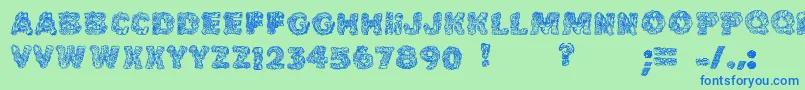 Cakefrostingdecorative-Schriftart – Blaue Schriften auf grünem Hintergrund