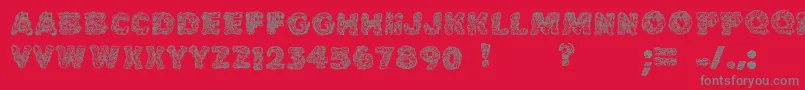 Cakefrostingdecorative Font – Gray Fonts on Red Background