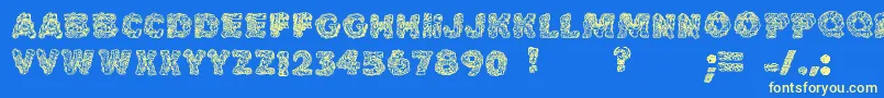 Cakefrostingdecorative-Schriftart – Gelbe Schriften auf blauem Hintergrund