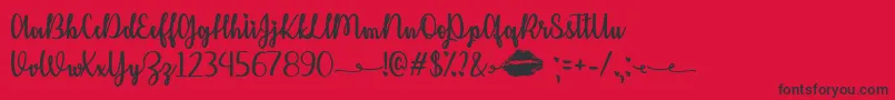 KissMeOrNotTtf Font – Black Fonts on Red Background
