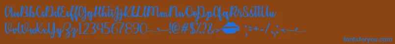Шрифт KissMeOrNotTtf – синие шрифты на коричневом фоне