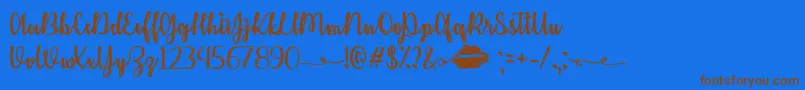 Шрифт KissMeOrNotTtf – коричневые шрифты на синем фоне