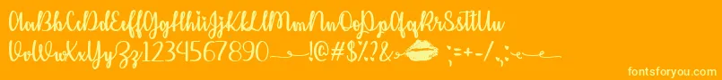 Czcionka KissMeOrNotTtf – żółte czcionki na pomarańczowym tle
