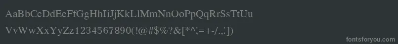 フォントKodchiangupc – 黒い背景に灰色の文字