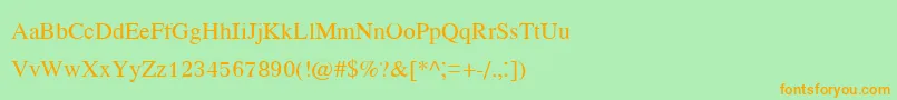 フォントKodchiangupc – オレンジの文字が緑の背景にあります。