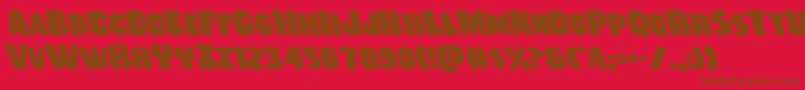 Rubberboyleft-Schriftart – Braune Schriften auf rotem Hintergrund