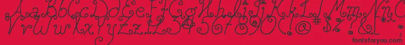 DjbSquirlyQ Font – Black Fonts on Red Background