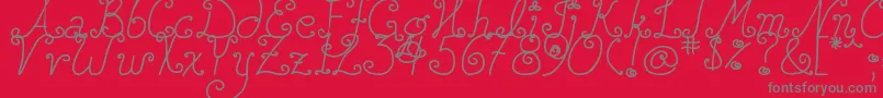 DjbSquirlyQ Font – Gray Fonts on Red Background