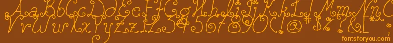 DjbSquirlyQ-Schriftart – Orangefarbene Schriften auf braunem Hintergrund