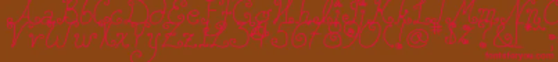 DjbSquirlyQ Font – Red Fonts on Brown Background