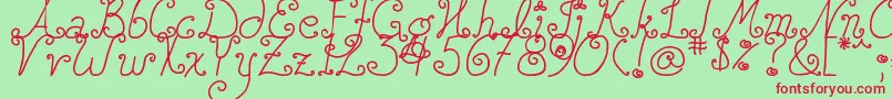 DjbSquirlyQ Font – Red Fonts on Green Background
