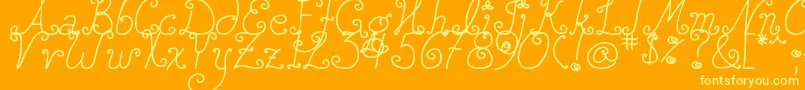 Czcionka DjbSquirlyQ – żółte czcionki na pomarańczowym tle