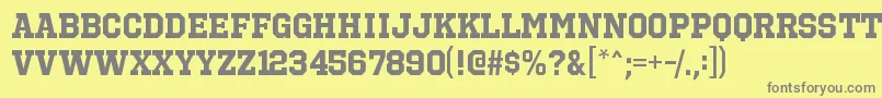 OctinsportsrgBold-fontti – harmaat kirjasimet keltaisella taustalla