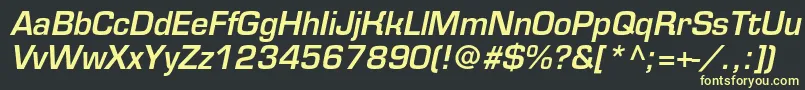 EurofontmediumcItalic-fontti – keltaiset fontit mustalla taustalla