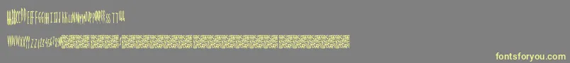 Magicalspringtime Font – Yellow Fonts on Gray Background