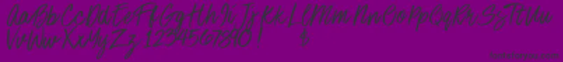 Шрифт Stoneheartsdemo – чёрные шрифты на фиолетовом фоне