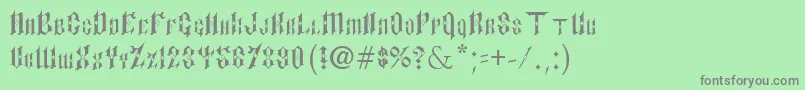 Fonte PaulsSinnerFont – fontes cinzas em um fundo verde