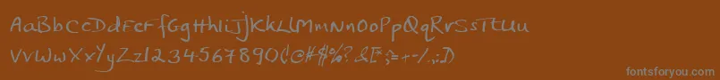 Jphst Font – Gray Fonts on Brown Background