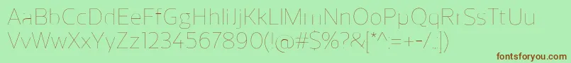 ReganUltralight Font – Brown Fonts on Green Background