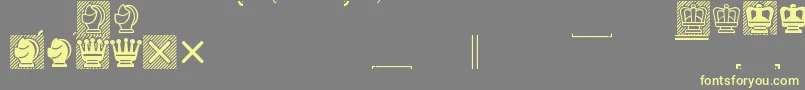 Mvalfont Font – Yellow Fonts on Gray Background