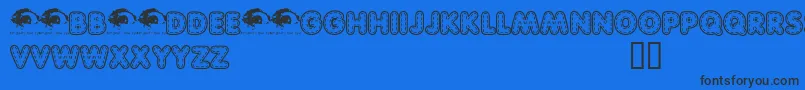 Quiltedtrial Font – Black Fonts on Blue Background