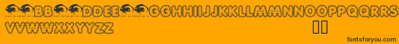 Quiltedtrial-Schriftart – Schwarze Schriften auf orangefarbenem Hintergrund