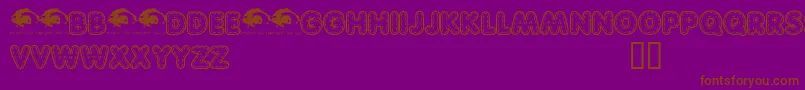 Quiltedtrial-Schriftart – Braune Schriften auf violettem Hintergrund