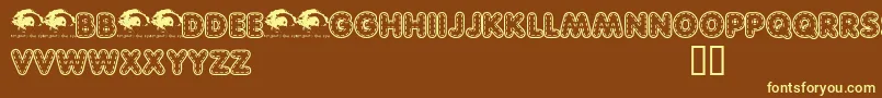 Quiltedtrial Font – Yellow Fonts on Brown Background