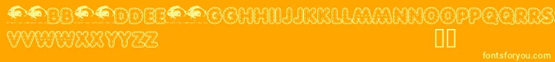 Quiltedtrial-Schriftart – Gelbe Schriften auf orangefarbenem Hintergrund