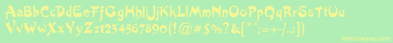 ArtistNouveau Font – Yellow Fonts on Green Background
