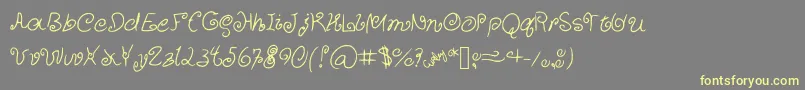 CurlyCuties Font – Yellow Fonts on Gray Background