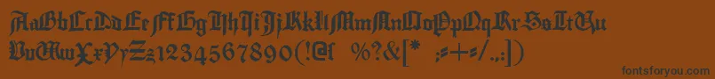 Gutenbergtextura Font – Black Fonts on Brown Background