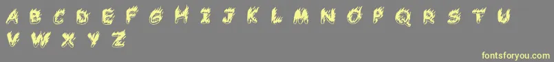 ComicTragedyBc-Schriftart – Gelbe Schriften auf grauem Hintergrund