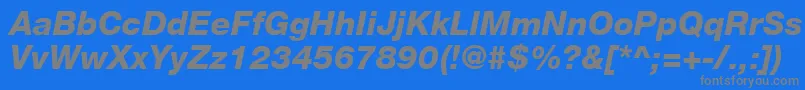 フォントHelveticaLt86HeavyItalic – 青い背景に灰色の文字