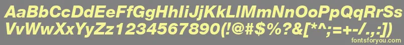 HelveticaLt86HeavyItalic-fontti – keltaiset fontit harmaalla taustalla