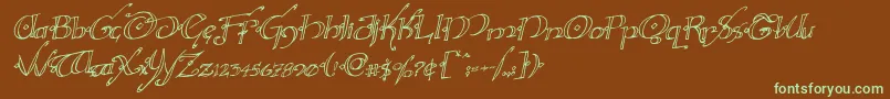 フォントHollyjinglerotal – 緑色の文字が茶色の背景にあります。