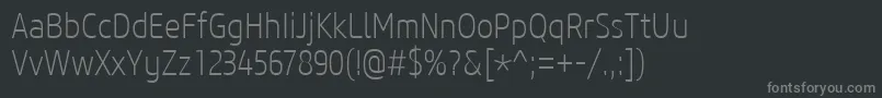 フォントCoreSansM27CnExtralight – 黒い背景に灰色の文字