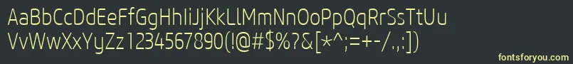 フォントCoreSansM27CnExtralight – 黒い背景に黄色の文字