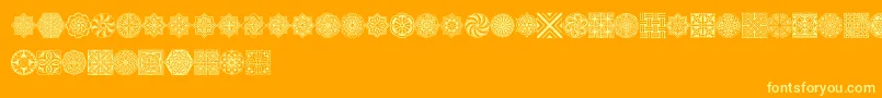 Henmanpictthree-Schriftart – Gelbe Schriften auf orangefarbenem Hintergrund